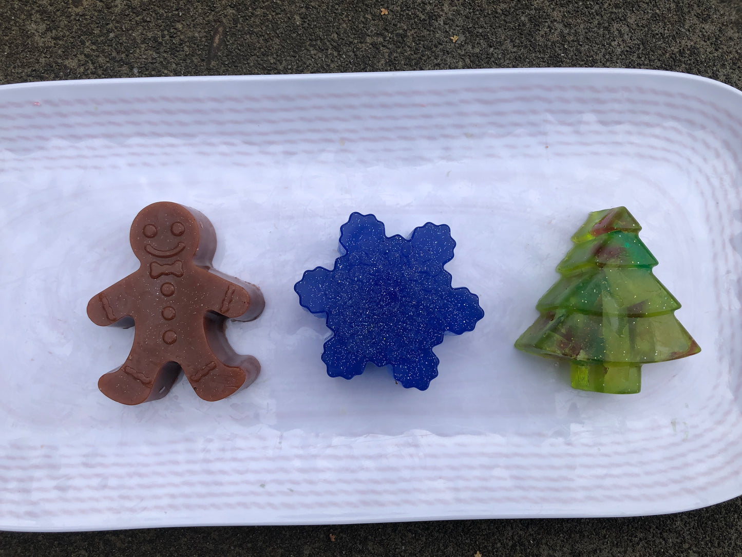 Holiday soap set. Gingerbread man, Snow flake and festive tree.