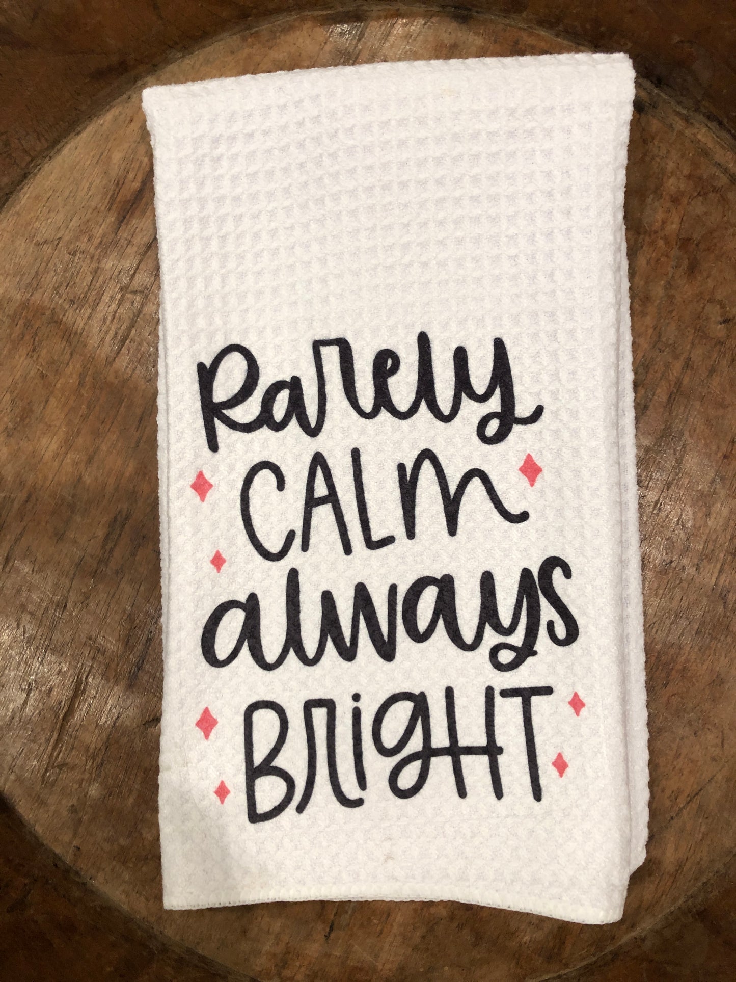 "Rarely Calm always bright" waffle weave towel