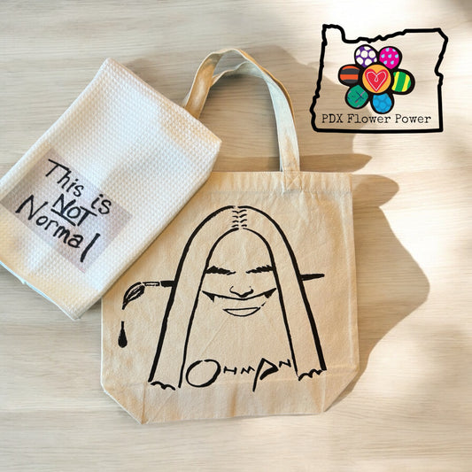 "This is Not Normal" dish towel featuring NM Representative Melanie Stansberry's sign & a Jack Ohman tote