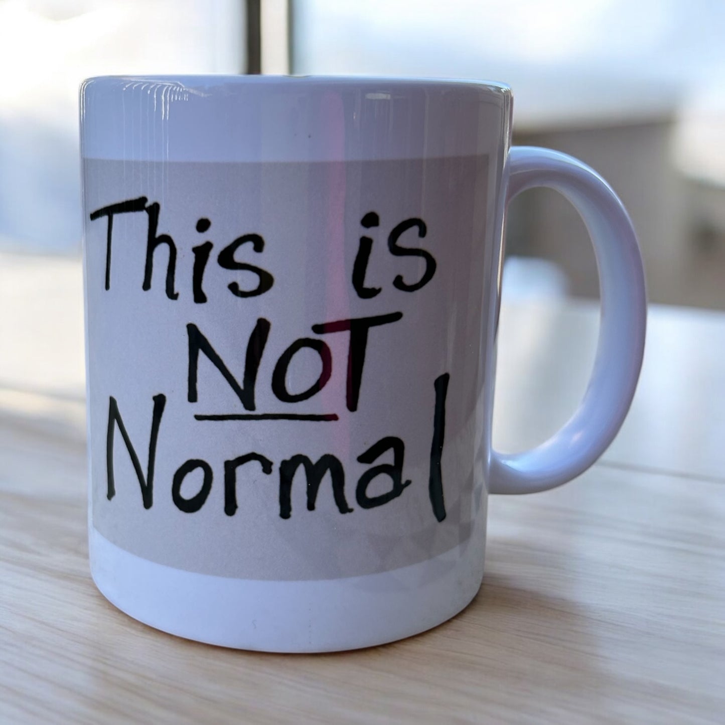 "This is Not Normal" mug, NM Representative Melanie Stansbury's sign, political mug.