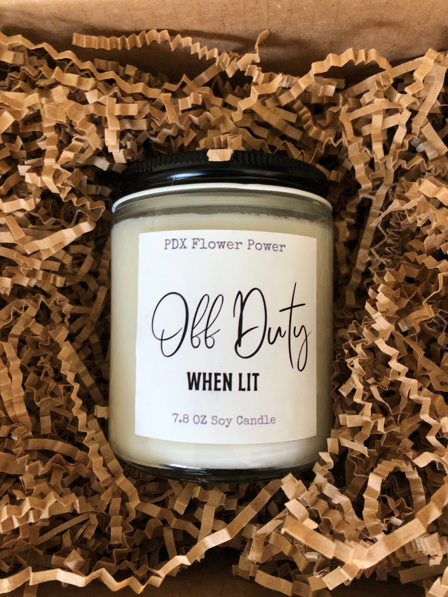 "Off Duty when lit" handcrafted soy candle